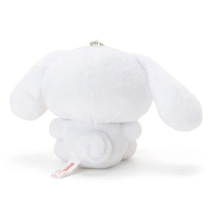 Cinnamoroll puppy mascot holder figure, official Sanrio merchandise for desktop decoration.