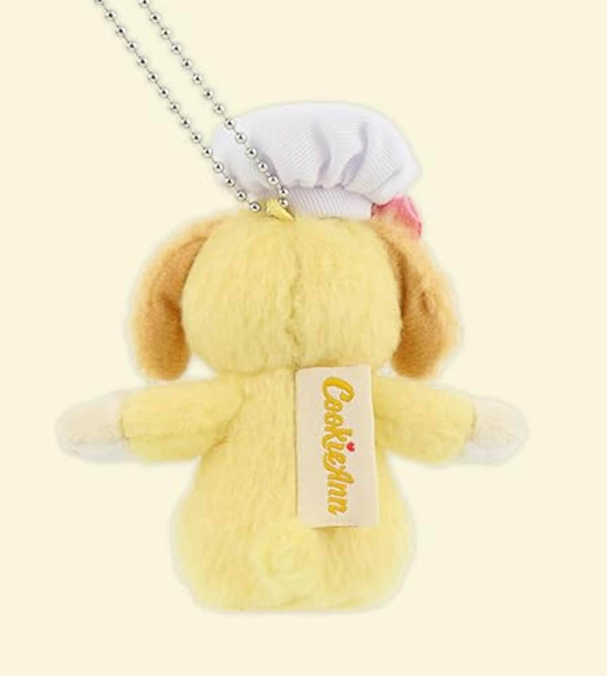 Authentic Tokyo Disney Resort brand labels on the back of the CookieAnn keychain - DARUMA AUSTRALIA PTY LTD