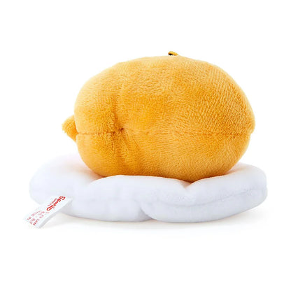 A cute Gudetama mascot figurine sitting on the corner.