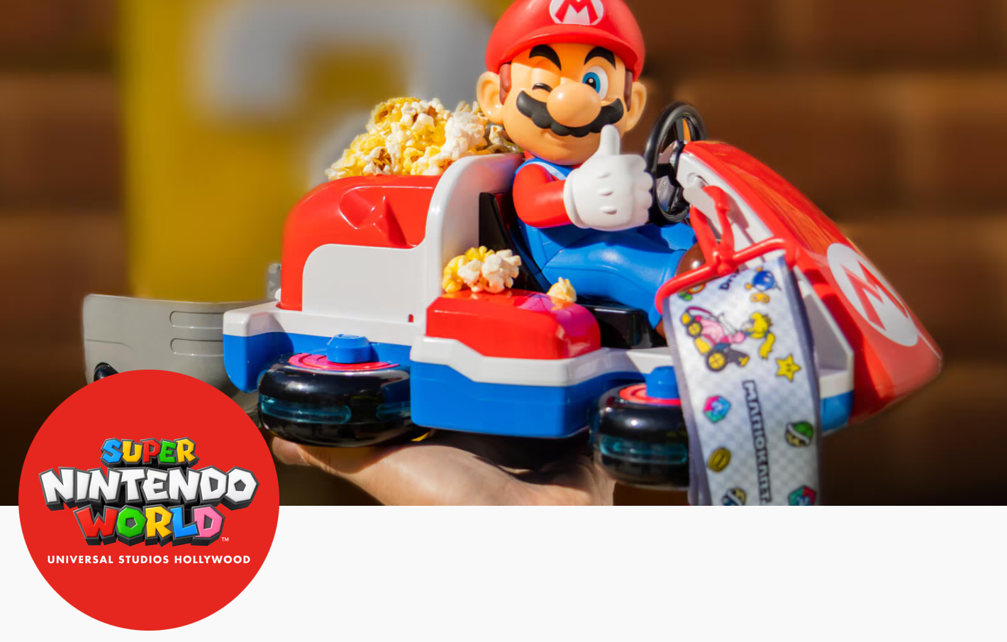 Official Mario Kart Car popcorn bucket from Universal Studios Japan, featuring Mario in his kart with blue light-up 'anti-gravity' wheels.
