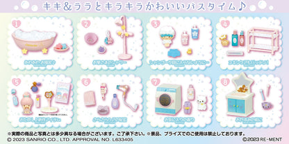 Set of small toy figures and accessories on a light blue background with Japanese text  - DARUMA AUSTRALIA PTY LTD