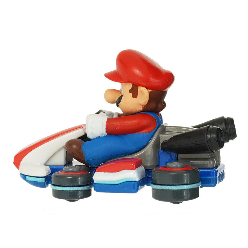 Toy figure of a character in a racing kart on a white background